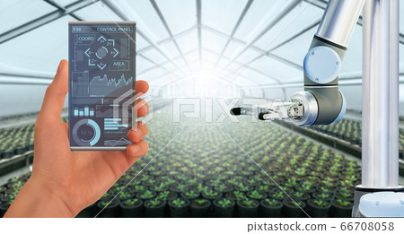 A farmer controls agricultural robot A farmer controls agricultural robot 66708058