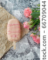 ice cream pops cake on gray background along with flowers. Selective focus, copy space 66709044