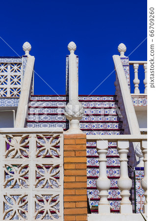 outdoor stairs with ornamental tiles and white railings outdoor stairs with ornamental tiles and white railings 66709260