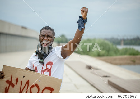 aggressive man dissatisfied with the work of the police in america, he want to achieve justice 66709668