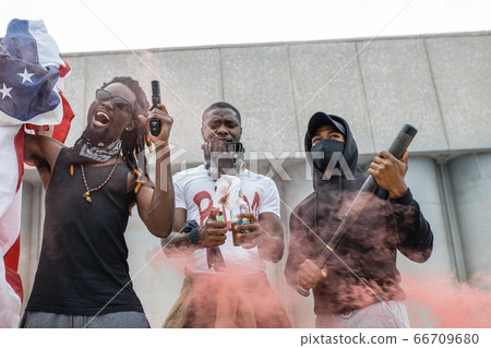 aggressive black people with guns in the streets 66709680