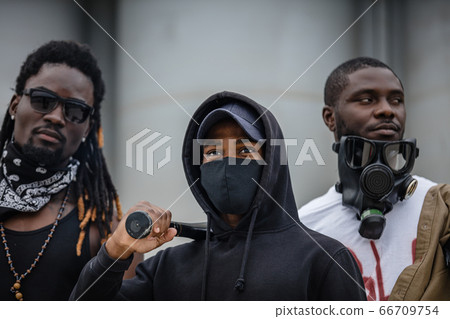 armed black activists go on anti-racism protest 66709754
