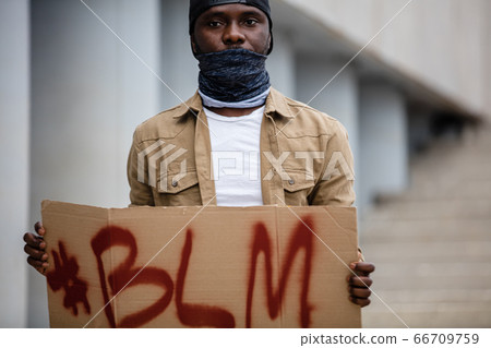 black man protest against injustice, blm concept 66709759