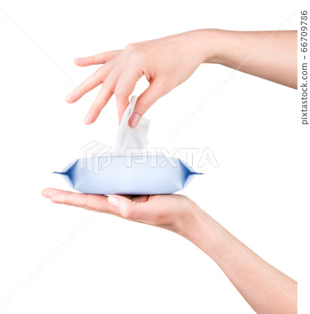 Woman hand use antibacterial wet wipes or tissue 66709786