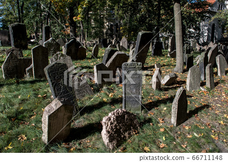 Old Weathered Tombstones On Jewish Cemetery In Prague In The Czech Republic Old Weathered Tombstones On Jewish Cemetery In Prague In The Czech Republic 66711148