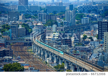 A view of the train passing through the prince from Kita Topia and the cityscape towards Saitama 66712008