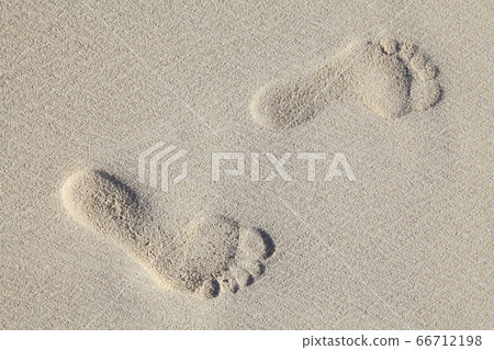 Footprints on sand beach Footprints on sand beach 66712198