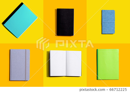 Notebooks on a tiled desk from above Notebooks on a tiled desk from above 66712225