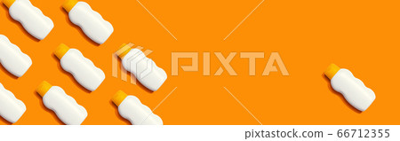 Yellow and white sunblock bottles Yellow and white sunblock bottles 66712355