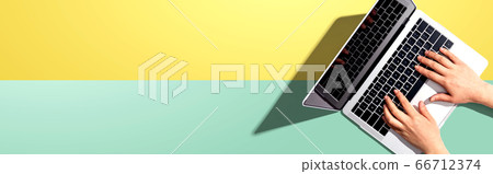 Person using laptop 66712374