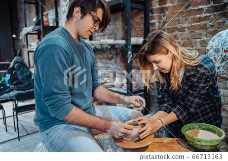 Making a handmade clay pot. Pottery lesson, hobby. 66713163