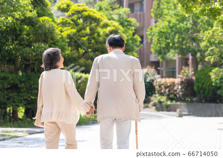 Senior couple, elderly care, back view Senior couple, elderly care, back view 66714050