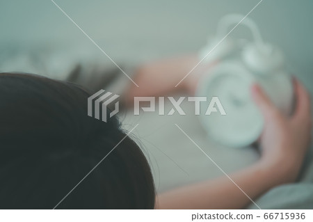 Women in their thirties who stop the alarm clock 66715936