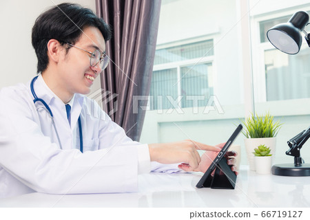 Doctor man smile using black modern smart digital 66719127