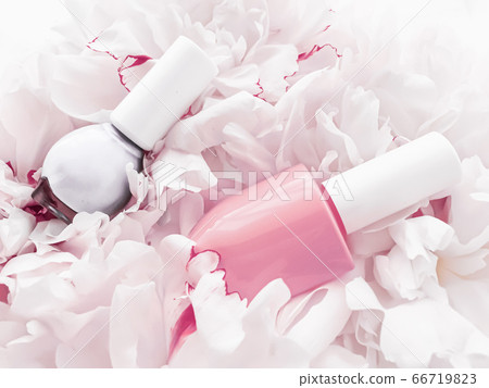 Nail polish bottles on floral background, french manicure and cosmetic branding 66719823