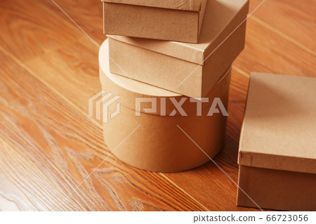 Cardboard mail boxes on the wooden floor of Cardboard mail boxes on the wooden floor of 66723056