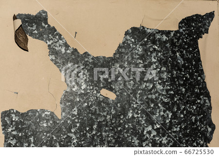 Close-up detail of cracked paint on rusty metal 66725530