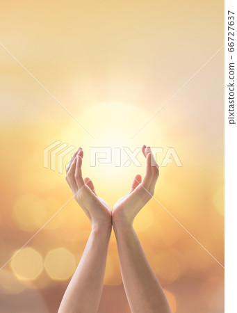 Mind and soul mantra yoga meditation, spiritual mental health practice with woman pose peaceful relaxation training with sunset golden hour summer june solstice sun and sky can candle light bokeh 66727637