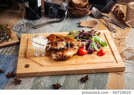 Appetizing grilled chicken with greens Appetizing grilled chicken with greens 66729020