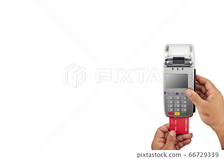 Men's hand is holding red credit card to terminal Men's hand is holding red credit card to terminal 66729339
