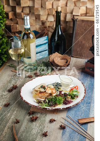 Cooked tender chicken breast with spinach Cooked tender chicken breast with spinach 66729545