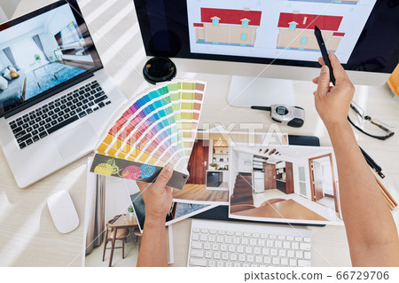 Designer working on color scheme 66729706