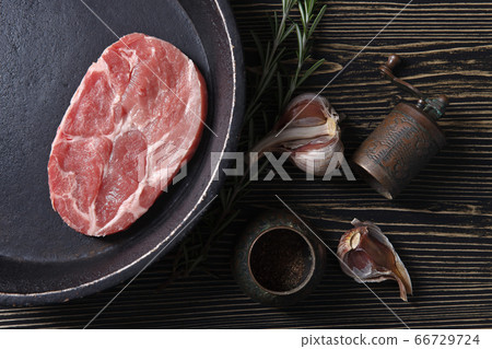 Pork steak with rosemary, garlic and pepper , top 66729724