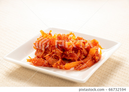 Kimchi on a white plate. Kimchi on a white plate. 66732594