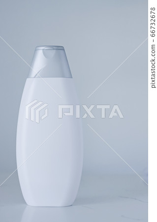 Blank label cosmetic container bottle as product mockup on gray background Blank label cosmetic container bottle as product mockup on gray background 66732678