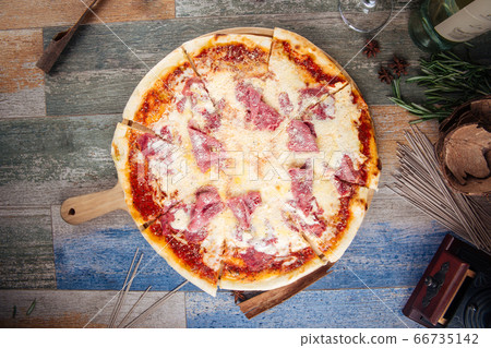Pizza carbonara with beef grated parmesan cheese 66735142