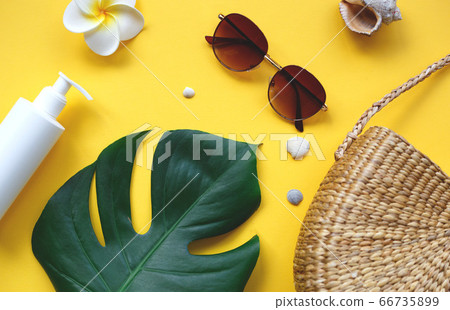 Flat lay traveler accessories on yellow background. vacation concept. 66735899