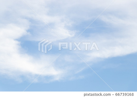 Clear blue sky with white cloud background 66739168
