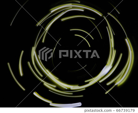 Yellow neon light sparkle swirl Yellow neon light sparkle swirl 66739179