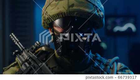 Portrait of soldier in full combat gear 66739317