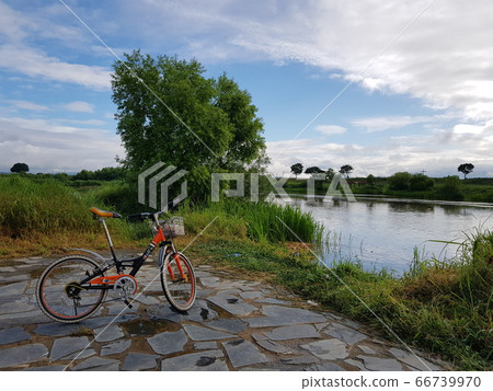 Bicycle walk, river 66739970