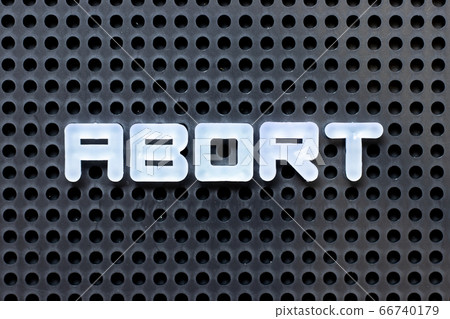 White color alphabet with word abort on black background 66740179