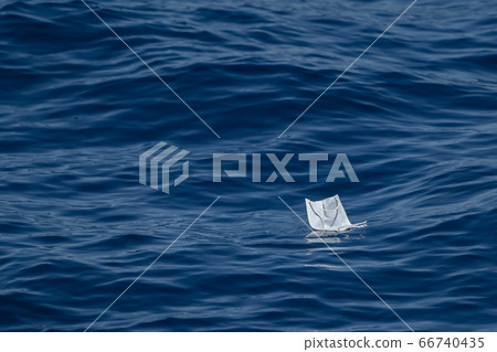 covid mask abandoned on sea water covid mask abandoned on sea water 66740435