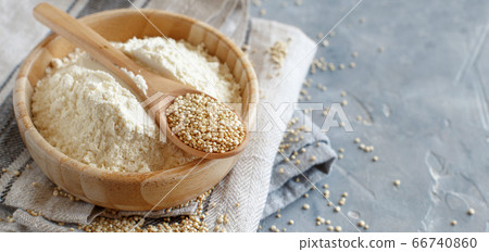 Raw dry white quinoa flour seeds close up Raw dry white quinoa flour seeds close up 66740860
