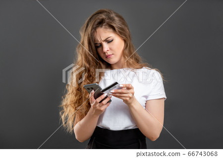 banking security troubled woman credit card phone banking security troubled woman credit card phone 66743068