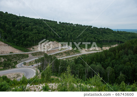 Winding road in the mountains 66743600