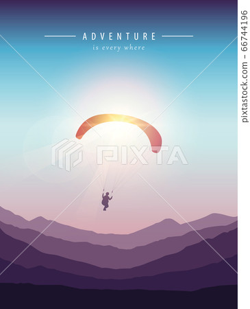 paragliding adventure mountain landscape at sunset 66744196