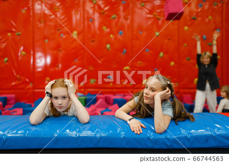Tired children and mother plays with soft cubes Tired children and mother plays with soft cubes 66744563