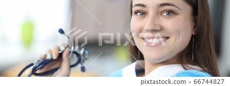 Nurse working in clinic 66744827