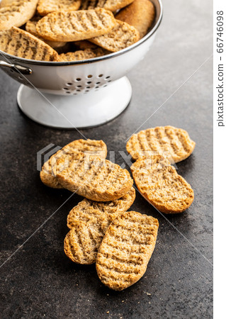 Rusk bread. Dried crispbread. 66746098