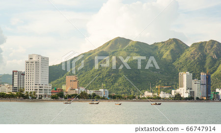 Panorama of one part of the city of Nha Trang with mountains. Panorama of one part of the city of Nha Trang with mountains. 66747914
