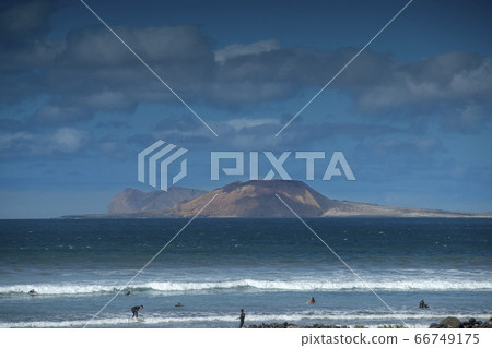 the sea and coast at Famara beach, Lanzarote. the sea and coast at Famara beach, Lanzarote. 66749175