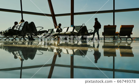 People at a modern airport, departure lounge. People at a modern airport, departure lounge. 66749378