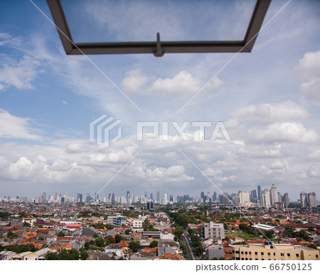 Jakarta city panorama against the background of the window pane. 66750125