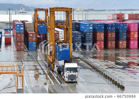 Container terminal view (cloudy) 66750984