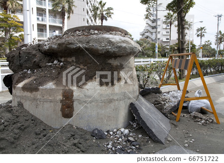 Manhole raised due to liquefaction phenomenon 66751722